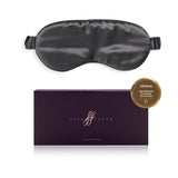 Charcoal silk eye mask with 'SilkSleek' branding and packaging on a white background