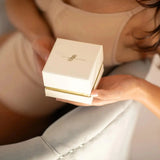 Woman Holding a Silk Scrunchies Gift Box 