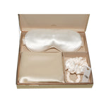 Silk eye mask, pillowcase and silk scrunchies set presented in a SilkSleek signature box on a white background.