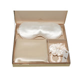 Silk eye mask, pillowcase and silk scrunchies set presented in a SilkSleek signature box on a white background.