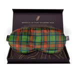 Plaid patterned sleep mask in a gift box with text about mulberry silk benefits.