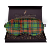 Plaid patterned sleep mask in a gift box with text about mulberry silk benefits.