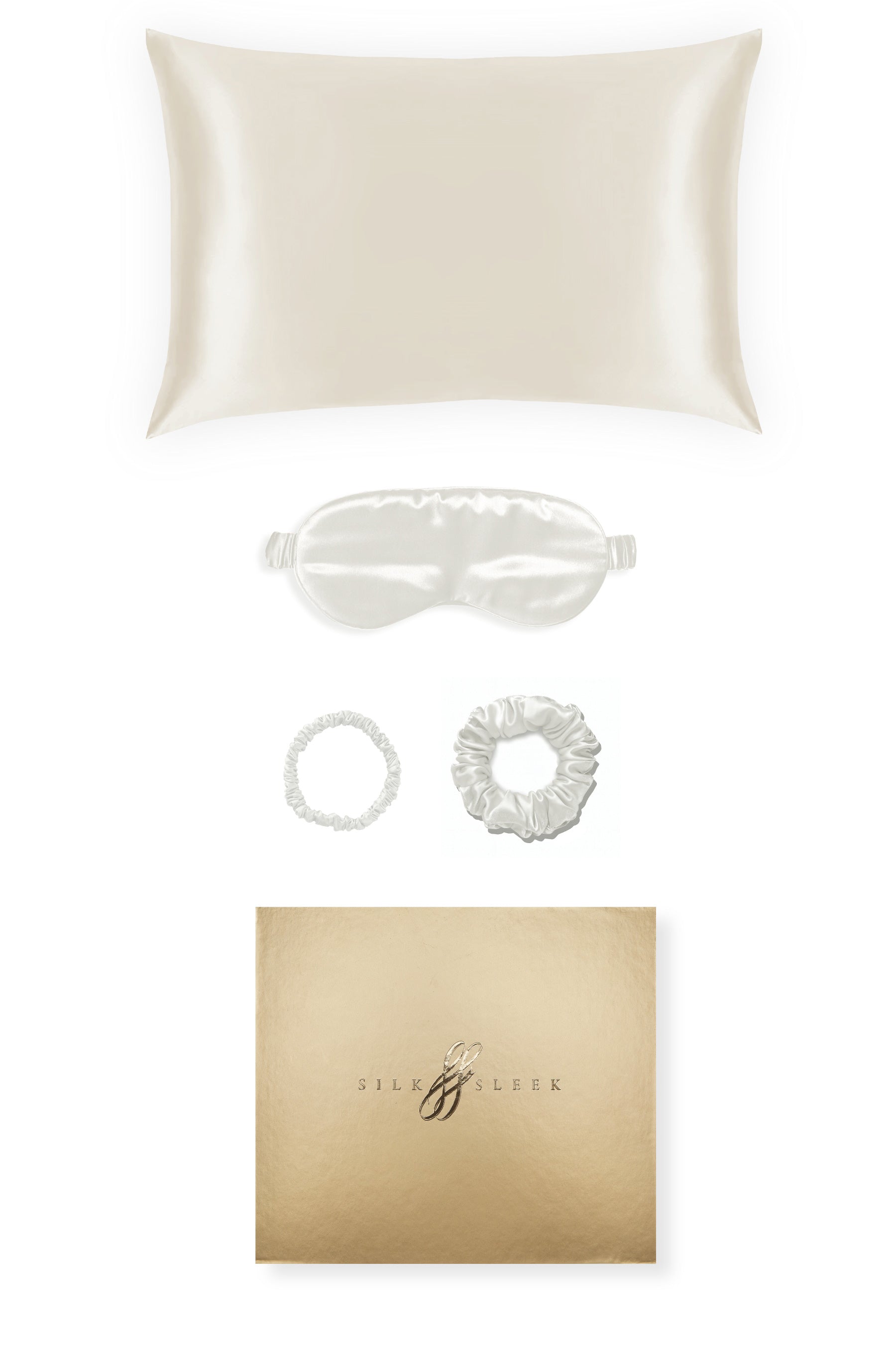 Silk pillowcase, eye mask and hair ties displayed on a white background beside a gold gift box.